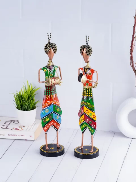 Image of bright colored tribal musicians made with wrought iron, a captivating addition to your home decor