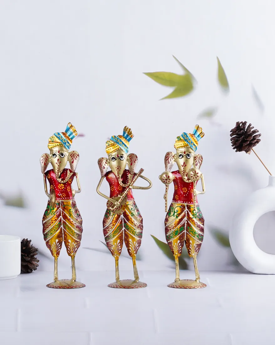 Colorful-Handcrafted-Wrought-Iron-Ganesh-Statues Image of a Harmony of Colors wrought iron musical Ganesh set, showcasing vibrant and handcrafted statues