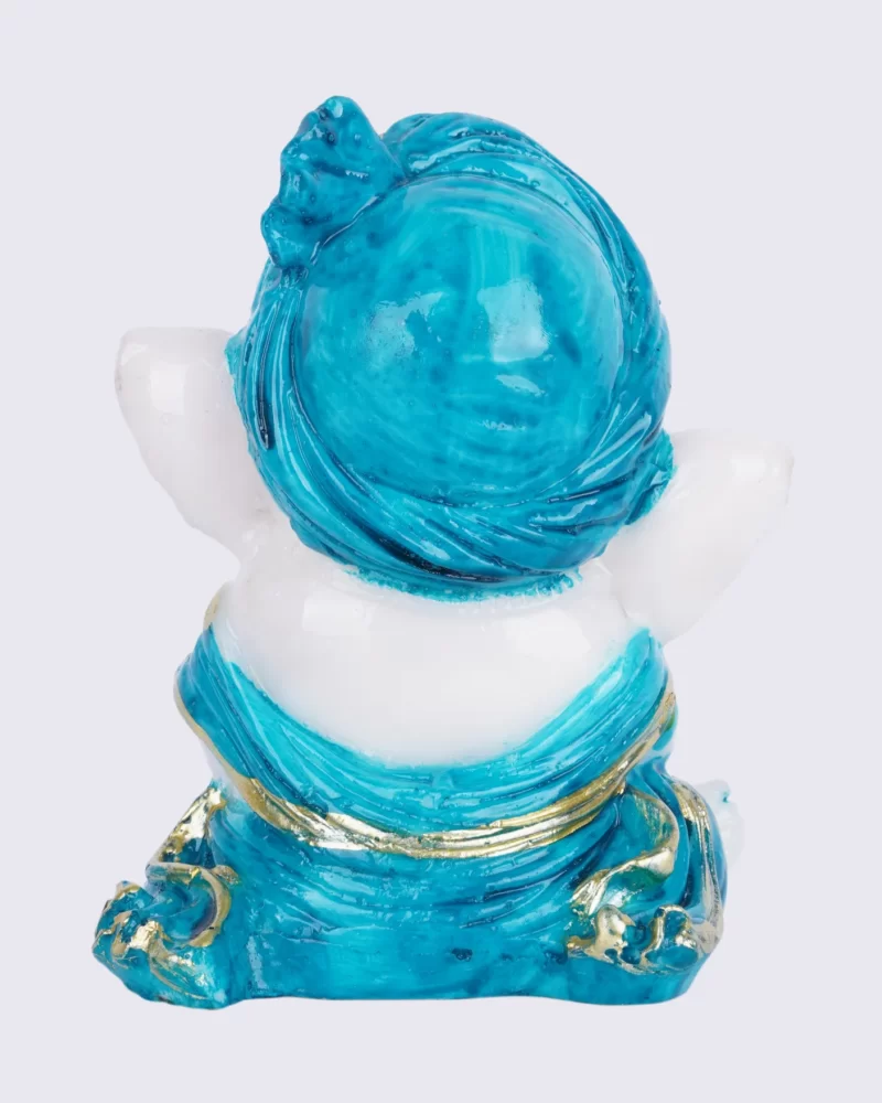 Artistic turquoise blue Ganesh statue, a symbol of divine wisdom and creativity
