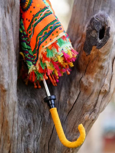 Front view of the Rajasthani decorative umbrella, showcasing its intricate design and vibrant colors