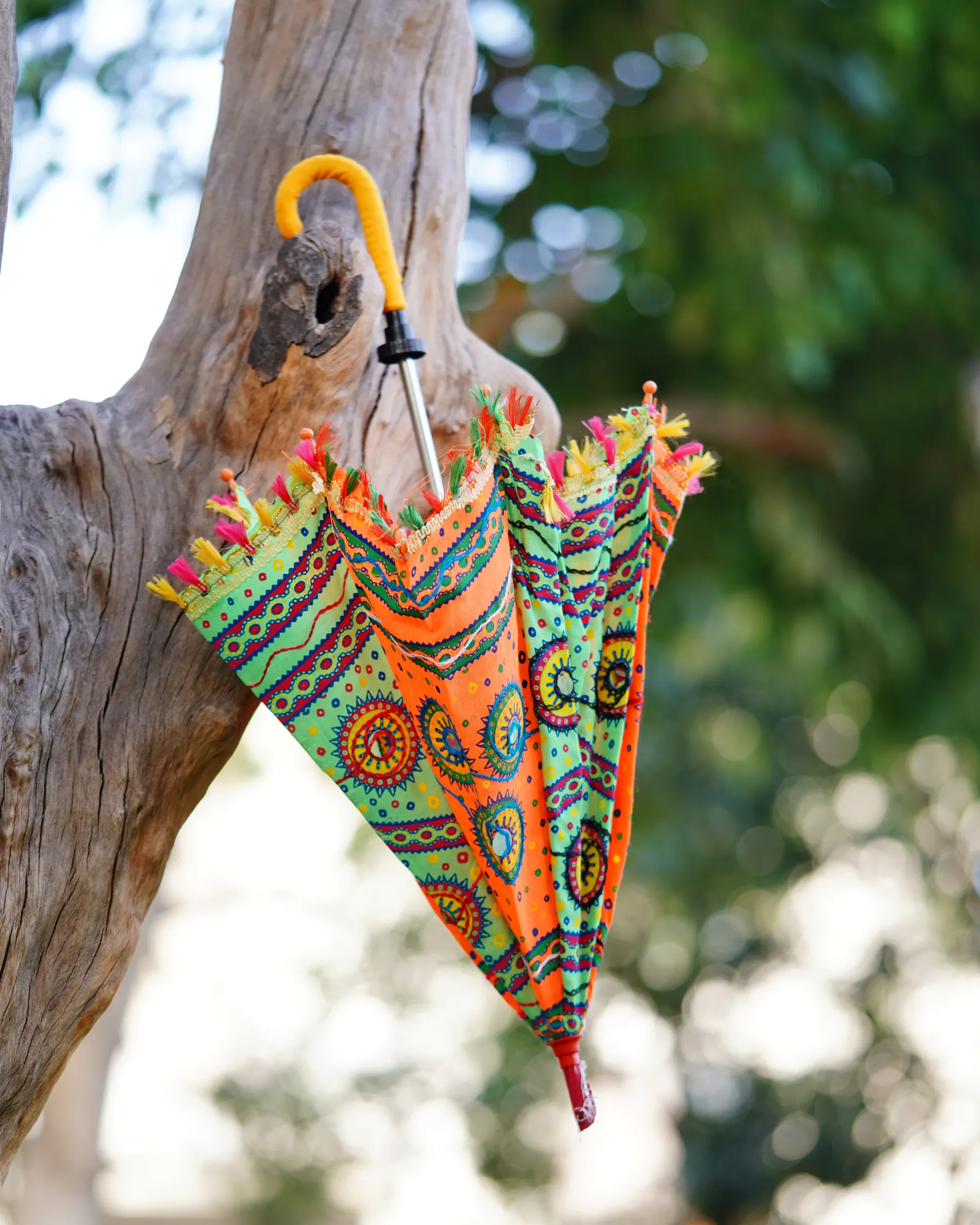 Traditional-Mirror-Work-Umbrella-Design Rajasthani umbrella used at an outdoor event, adding a vibrant and festive atmosphere