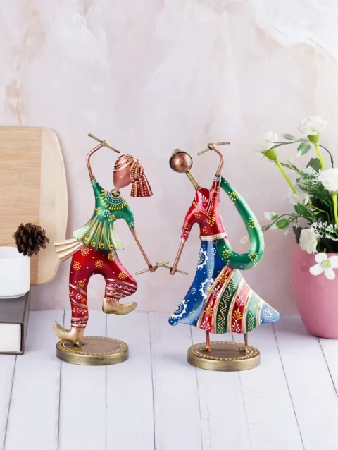 Handcrafted dancing couple wrought iron statue, capturing the essence of Guajarati culture