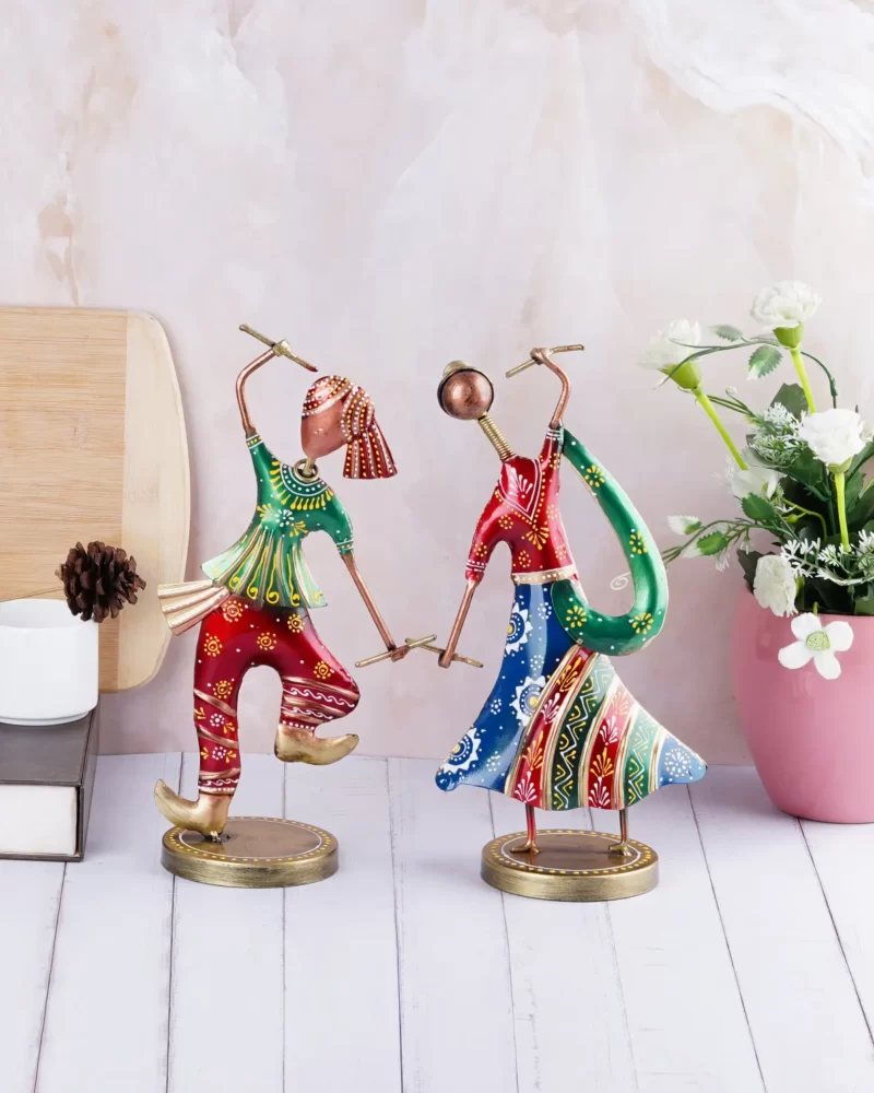 Handcrafted dancing couple wrought iron statue, capturing the essence of Guajarati culture