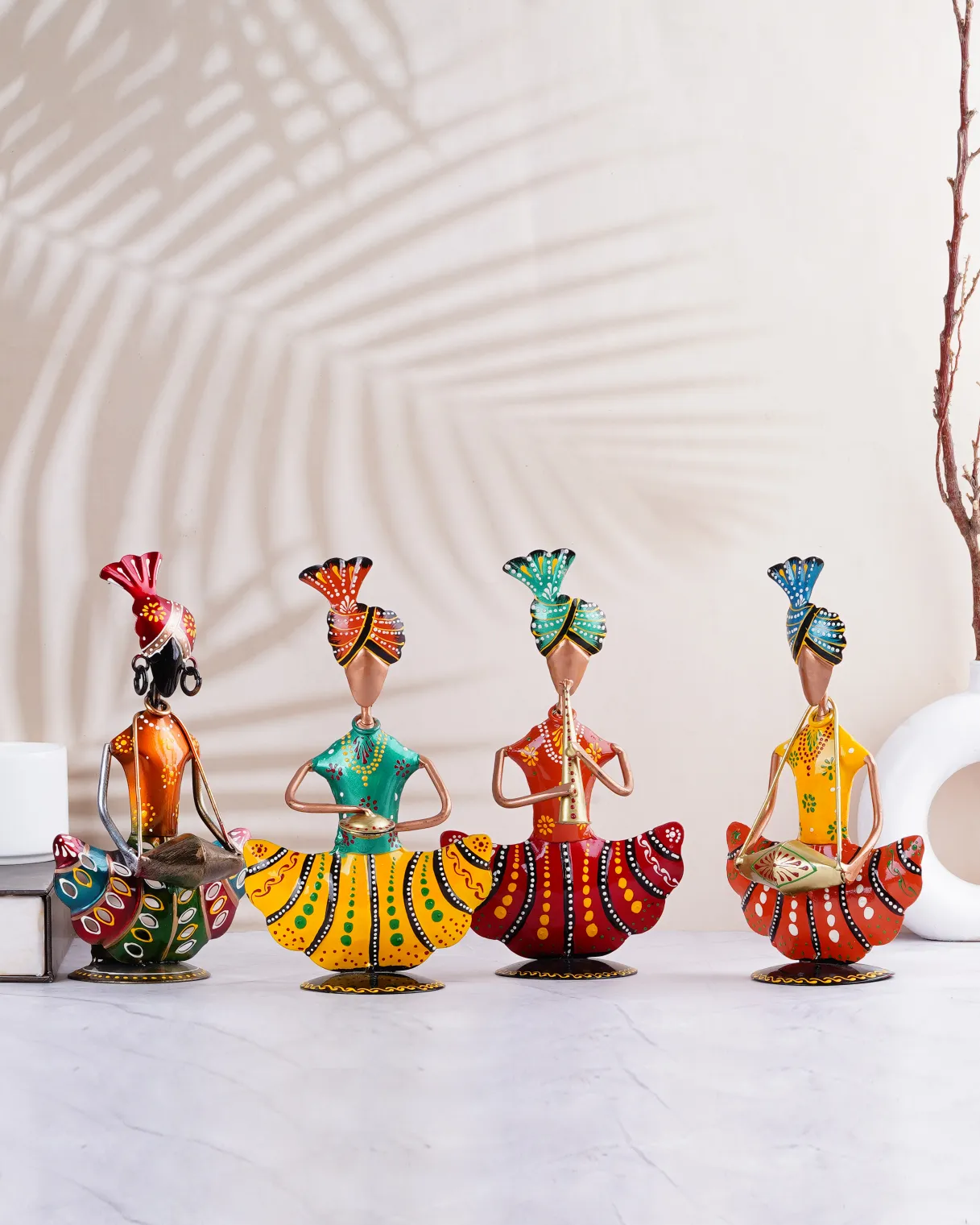 Colorful Rajasthan musician sculpture, showcasing the traditional attire and instruments of the region